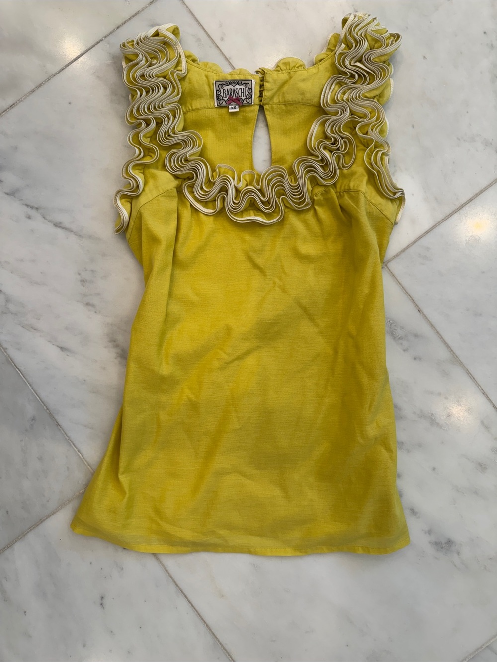 Yellow Sleeveless Blouses with White and Yellow Ruffle-Trim Blouse. Lined.